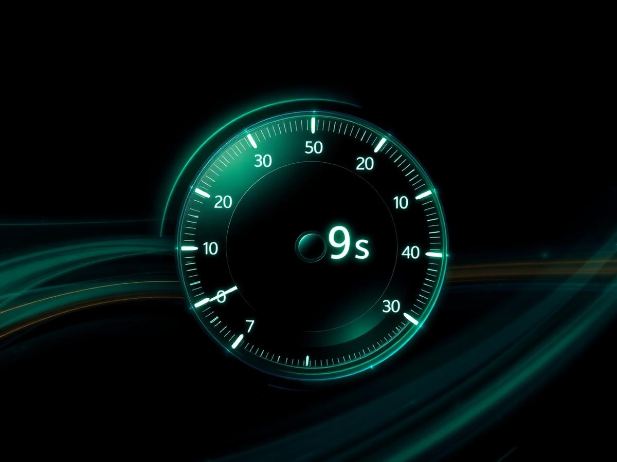 Glowing green performance speedometer reading 0.9 seconds